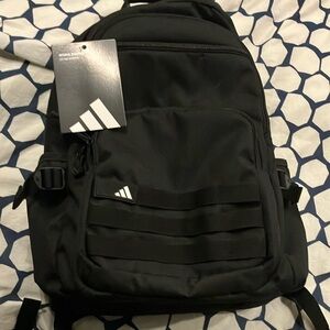 Black Backpack by Adidas with computer/tablet storage and water bottle pockets.